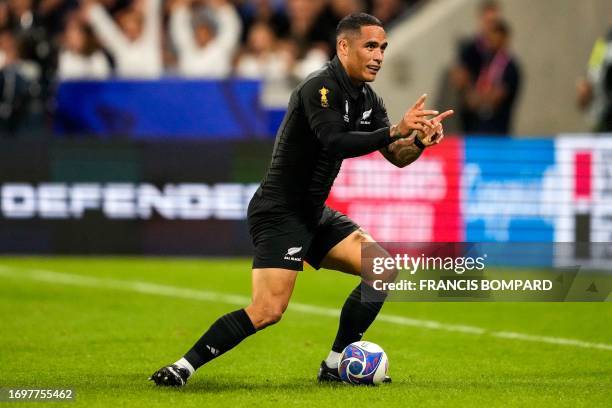 New Zealand's scrum-half Aaron Smith celebrates after scoring a try during the France 2023 Rugby World Cup Pool A match between New Zealand and Italy...