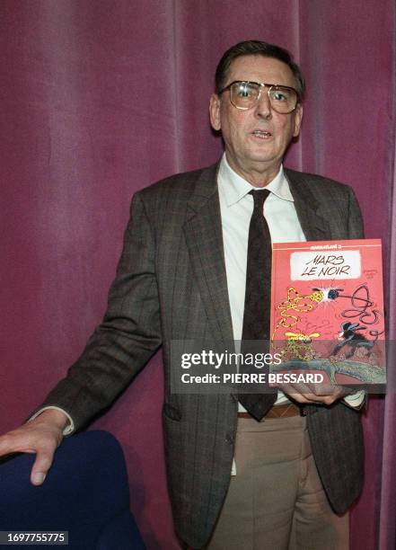 Picture dated 18 March 1989 of Belgian comics artist André Franquin, holding a press conference at the first European Comics Show in Grenoble. André...