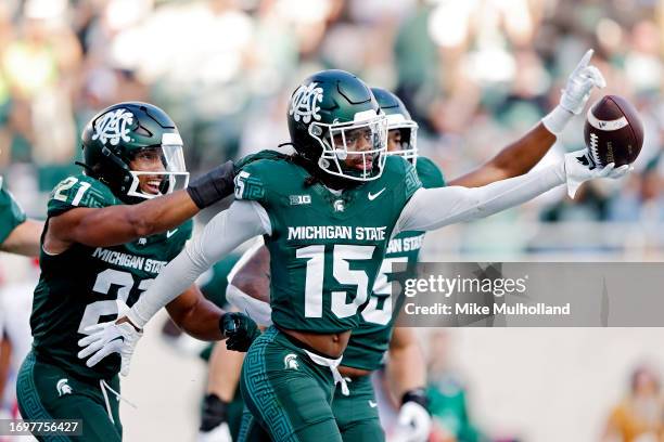 Angelo Grose of the Michigan State Spartans reacts after catching an interception in the third quarter of a game against the Maryland Terrapins at...