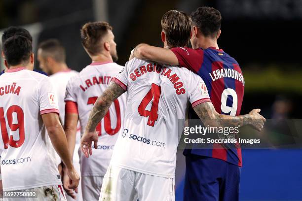 Sergio Ramos of Sevilla FC, Robert Lewandowski of FC Barcelona during the LaLiga EA Sports match between FC Barcelona v Sevilla at the Lluis Companys...