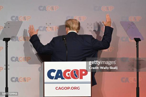 Anaheim, California Former U.S. President Donald Trump turns around and gestures as he delivers an address during the California Republican...