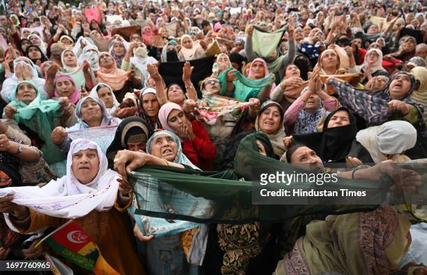 Muslims devotees pray as the head priest displays the holy relic of the Prophet Muhammed on Eid-e-Milad-u-Nabi, the birthday of the Prophet Muhammad,...
