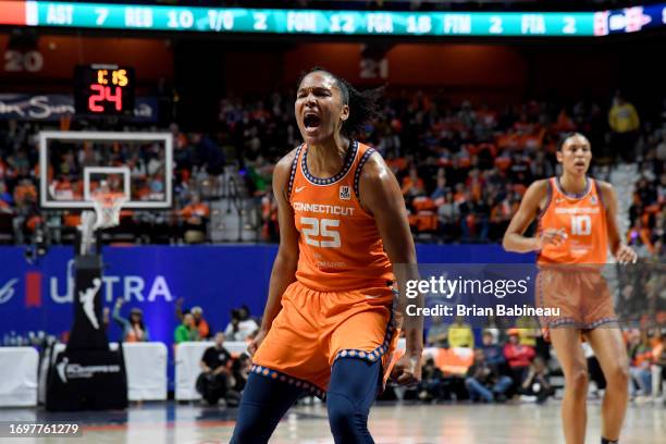 Alyssa Thomas of the Connecticut Sun celebrates a play during game three of the 2023 WNBA Playoffs semifinals against the New York Liberty on...