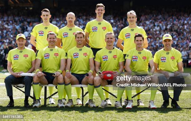 The Umpires pose for their photograph during the 2023 AFL Grand Final match between the Collingwood Magpies and the Brisbane Lions at the Melbourne...