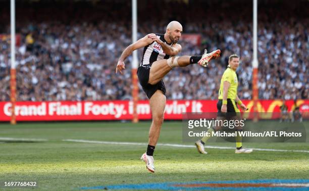 Steele Sidebottom of the Magpies kicks a goal during the 2023 AFL Grand Final match between the Collingwood Magpies and the Brisbane Lions at the...