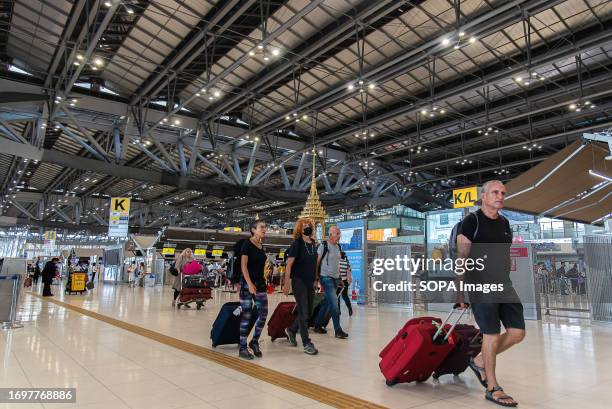 Passengers seen at Suvarnabhumi International Airport. The new SAT-1 terminal at Suvarnabhumi International Airport had a soft opening today, with...