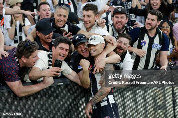 Jamie Elliott of the Magpies celebrates after the 2023 AFL Grand Final match between the Collingwood Magpies and the Brisbane Lions at the Melbourne...