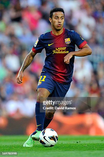 AThiago Alcantara of FC Barcelona runs with the ball during the La Liga match between FC Barcelona and Malaga CF at Camp Nou on June 1, 2013 in...