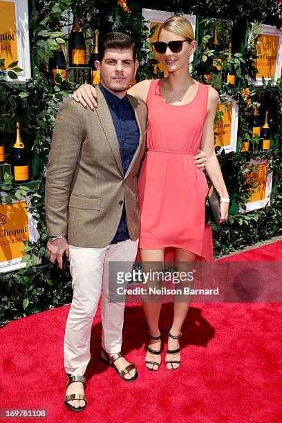 Eli Mizrahi and model Patricia van der Vliet attends the sixth annual Veuve Clicquot Polo Classic on June 1, 2013 in Jersey City.