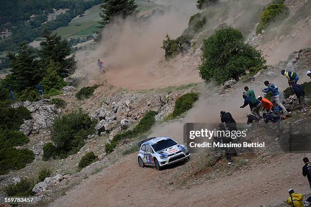 Andreas Mikkelsen of Norway and Mikko Markkula of Finland compete in their Volkswagen Motorsport II Polo R WRC during Day One of the WRC Greece on...