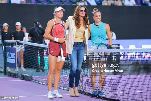 Caroline Dolehide of United States and Maria Sakkari of Greece pose with former tenis player Gabriela Sabatini of Argentina as part of the final day...