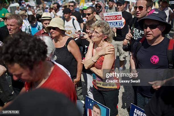 Marilyn Vogt-Downy from Brooklyn, N.Y., center, and others gather for a mass rally in support for PFC Bradley Manning on June 1, 2013 in Fort Meade,...