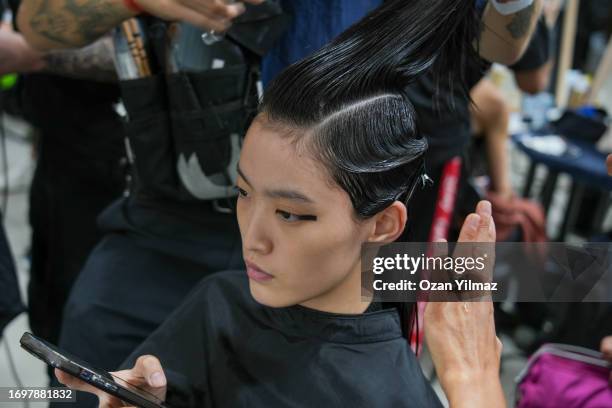 Model backstage ahead of the Jil Sander fashion show during the Milan Fashion Week Womenswear Spring/Summer 2024 on September 23, 2023 in Milan,...