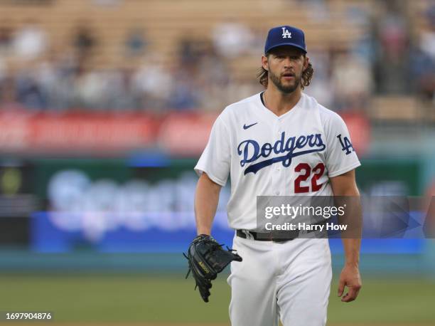 Clayton Kershaw of the Los Angeles Dodgers reacts as he leaves the mound at the end of the first inning against the San Francisco Giants at Dodger...