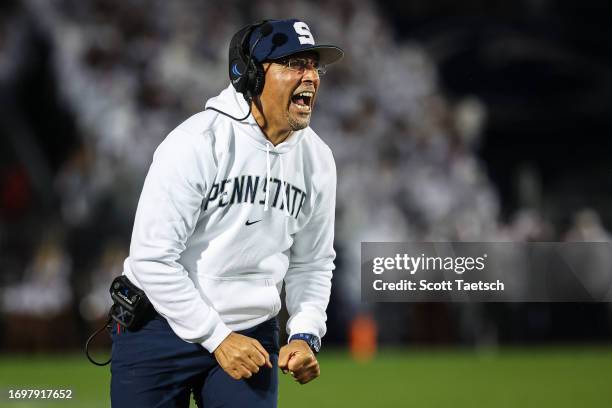 Head coach James Franklin of the Penn State Nittany Lions reacts after a touchdown against the Iowa Hawkeyes during the first half at Beaver Stadium...