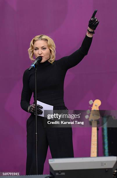 Madonna presents on stage at the "Chime For Change: The Sound Of Change Live" Concert at Twickenham Stadium on June 1, 2013 in London, England. Chime...