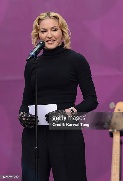 Madonna presents on stage at the "Chime For Change: The Sound Of Change Live" Concert at Twickenham Stadium on June 1, 2013 in London, England. Chime...