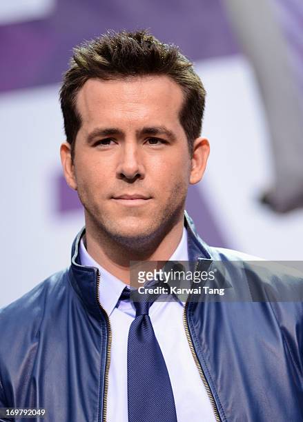 Ryan Reynolds presents on stage at the "Chime For Change: The Sound Of Change Live" Concert at Twickenham Stadium on June 1, 2013 in London, England....