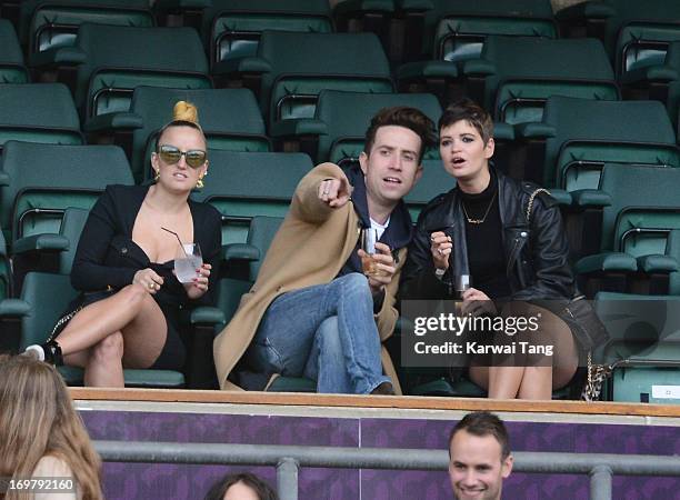 Nick Grimshaw and Pixie Geldof watches the "Chime For Change: The Sound Of Change Live" Concert at Twickenham Stadium on June 1, 2013 in London,...