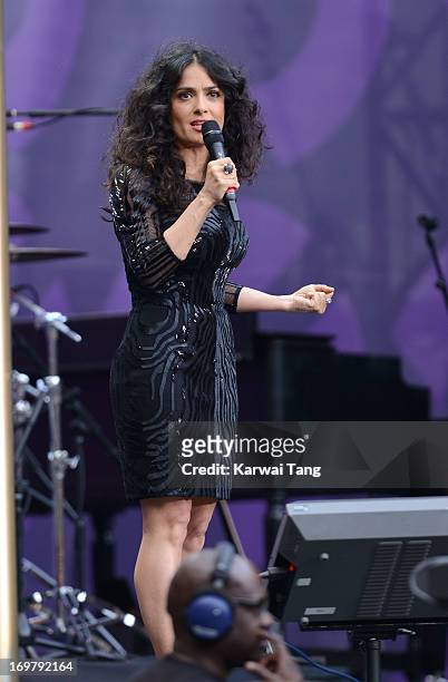 Salma Hayek Pinault presents on stage at the "Chime For Change: The Sound Of Change Live" Concert at Twickenham Stadium on June 1, 2013 in London,...