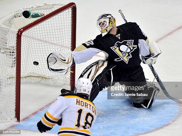 Nathan Horton of the Boston Bruins scores a goal on Tomas Vokoun of the Pittsburgh Penguins in the third period during Game One of the Eastern...