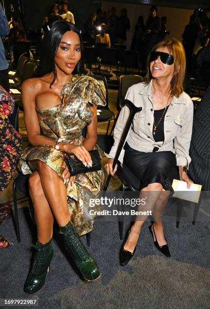 Munroe Bergdorf and Carine Roitfeld attend the Andreas Kronthaler For Vivienne Westwood SS24 show during Paris Fashion Week Womenswear Spring/Summer...