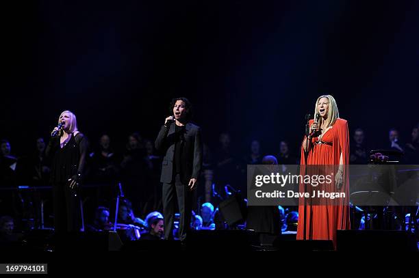 Musician Barbra Streisand performs with her sister Roslyn Kind and son Jason Gould on stage in concert at O2 Arena on June 1, 2013 in London, England.