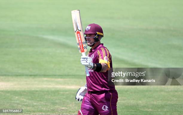 Ben McDermott of Queensland celebrates scoring a half century during the Marsh One Day Cup match between Queensland and Western Australia at Allan...