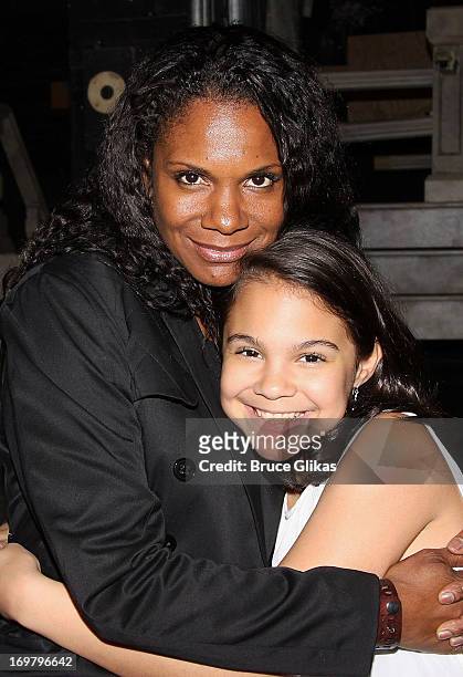 Audra McDonald and daughter Zoe Madeline Donovan pose backstage at the hit musical "Cinderella" on Broadway at The Broadway Theater on June 1, 2013...