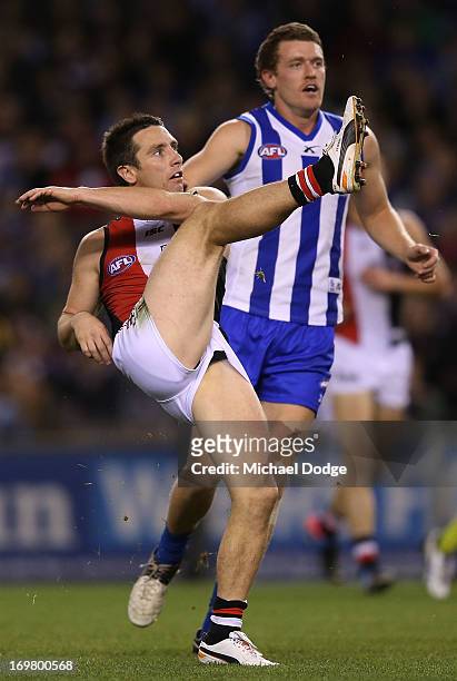 Stephen Milne of the Saints kicks the ball for a goal during the round ten AFL match between the North Melbourne Kangaroos and the St Kilda Saints at...