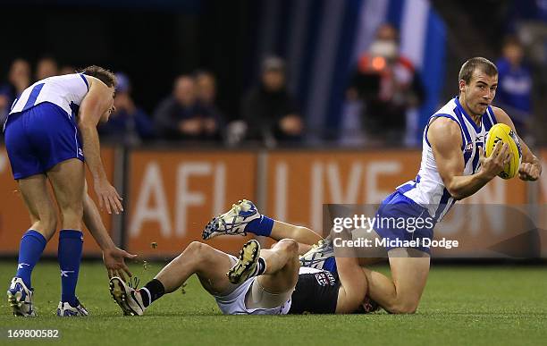 Ben Cunnington of the Kangaroos contests for the ball during the round ten AFL match between the North Melbourne Kangaroos and the St Kilda Saints at...