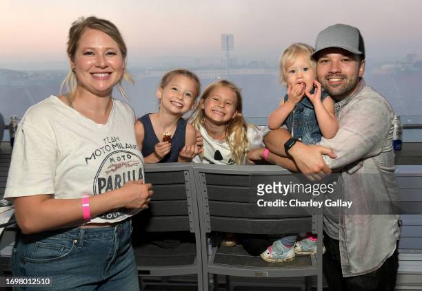 London Kress and Nathan Kress with family attend the SuperMotocross World Championship Finals Celebrity Night at Los Angeles Memorial Coliseum on...