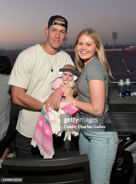 Dallin Lambert and Bella Lambert attend the SuperMotocross World Championship Finals Celebrity Night at Los Angeles Memorial Coliseum on September...