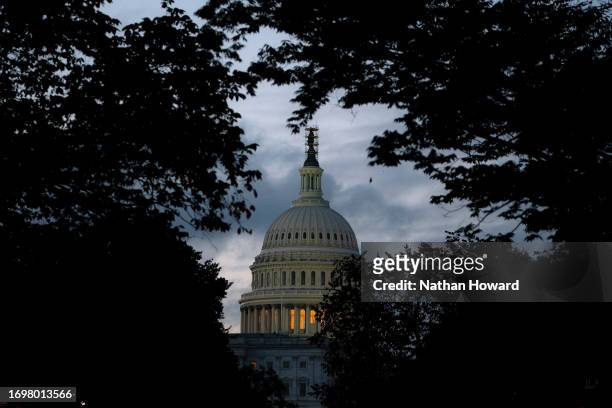 The US Capitol is seen at sunrise on September 30, 2023 in Washington, DC. The government is expected to enter a shutdown at midnight if a...