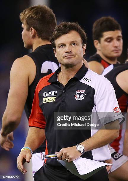 Saints coach Scott Watters looks ahead during the round ten AFL match between the North Melbourne Kangaroos and the St Kilda Saints at Etihad Stadium...