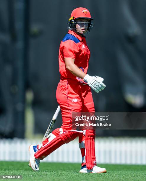 Madeline Penna of the Scorpions leaves the ground after getting out to Jannatul Sumona of the Meteors during the WNCL match between South Australia...