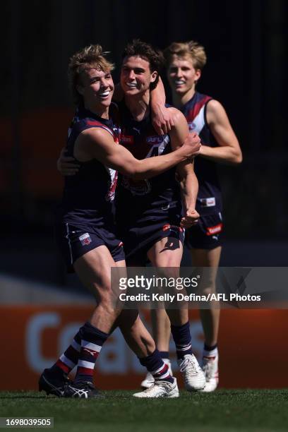 Will Brown of the Dragons and Ryley Sanders of the Dragons celebrate during the Coates Talent League Boys Grand Final match between Sandringham...
