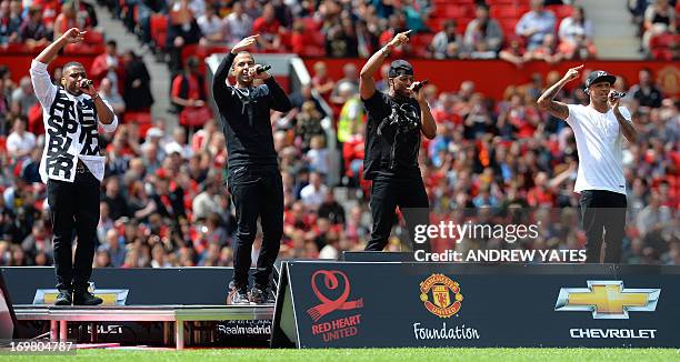 Boyband JLS perform before a Charity football match between Manchester United legends and Real Madrid Legends at Old Trafford in Manchester,...