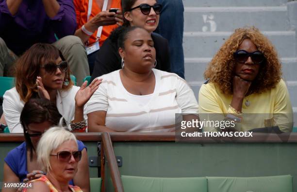 Serena Williams' sisters Venus, half sister Isha Price and their mother Oracene Price attend Serena's French tennis Open round of 16 match at the...