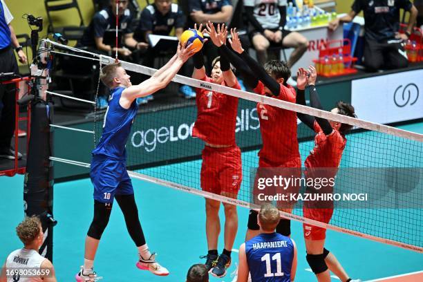 Finland's Luka Marttila pushes the ball during the match between Japan and Finland in the Volleyball World Cup 2023 men's Olympic qualifying...