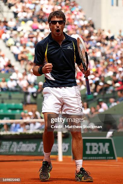 Tommy Robredo of Spain celebrates a point during his Men's Singles match against Nicolas Almargo of Spain during day eight of the French Open at...