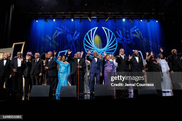 Congressional Black Caucus members pose onstage at the Congressional Black Caucus Foundation Annual Legislative Conference Phoenix Awards on...