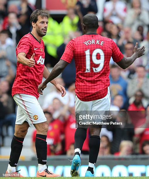 Ruud van Nistelrooy and Dwight Yorke of Manchester United celebrate the equaliser during the MU Foundation Charity Legends match between Manchester...