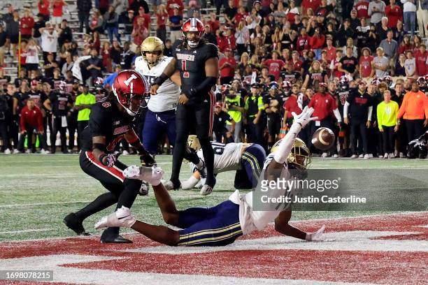 Jasaiah Gathings of the Akron Zips is unable make a catch for a two point conversion during 4th overtime in the game against the Indiana Hoosiers at...