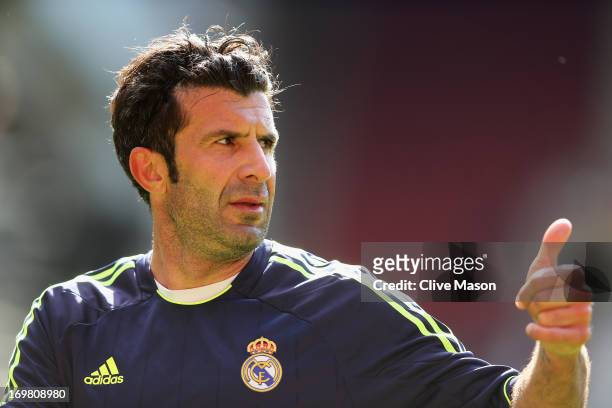 Luis Figo of Real Madrid in action during the match between Manchester United Legends and Real Madrid Legends at Old Trafford on June 2, 2013 in...