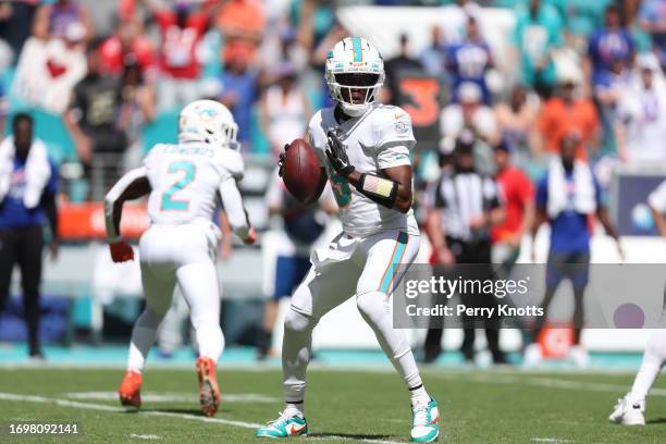 Teddy Bridgewater of the Miami Dolphins looks to throw a pass against the Buffalo Bills during the game at Hard Rock Stadium on September 25, 2022 in...