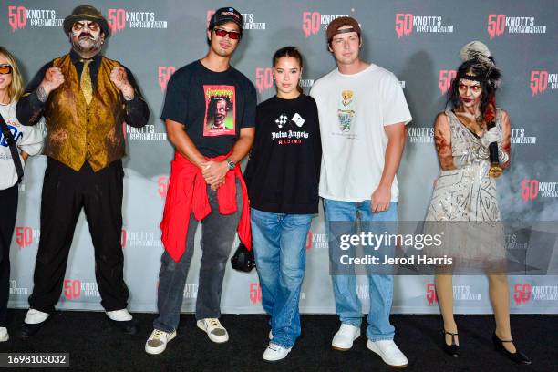 Ross Butler, Tessa Brooks and Blake Gray attend Knott's Scary Farm 50th Anniversary Celebrity Black Carpet at Knott's Berry Farm on September 23,...