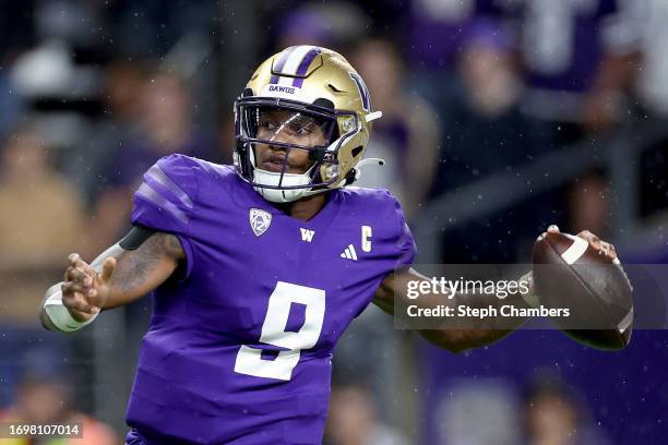 Michael Penix Jr. #9 of the Washington Huskies passes during the second quarter against the California Golden Bears at Husky Stadium on September 23,...