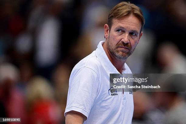 Head coach Martin Schwalb of Hamburg looks on during the EHF Final Four final match between FC Barcelona Intersport and HSV Hamburg at Lanxess Arena...