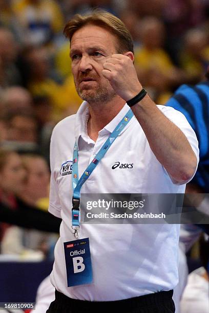 Head coach Martin Schwalb of Hamburg reacts during the EHF Final Four final match between FC Barcelona Intersport and HSV Hamburg at Lanxess Arena on...